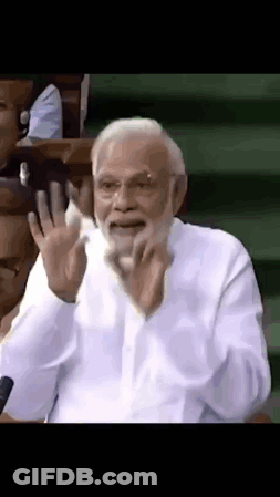 Bearded Man With Hands Up Making Funny Face GIF