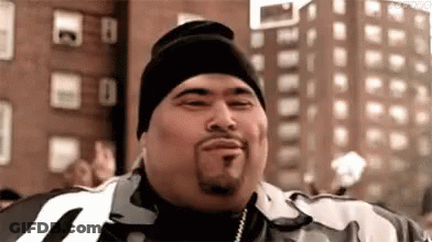 Bearded Man With Hat In Front Of City Street GIF