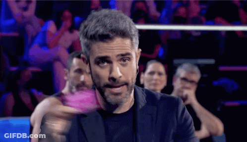 Bearded Man With Head Microphone Before Crowd GIF
