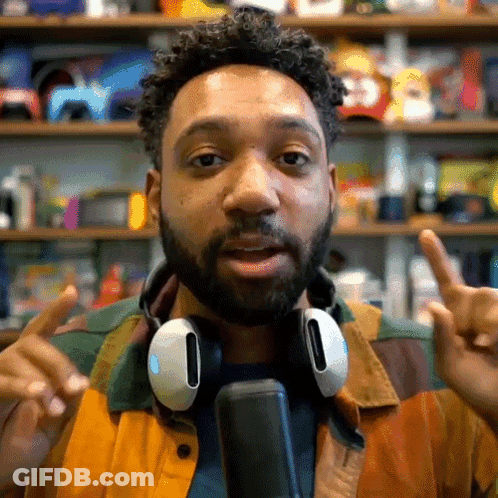 Bearded Man With Headphones And Colorful Jacket GIF