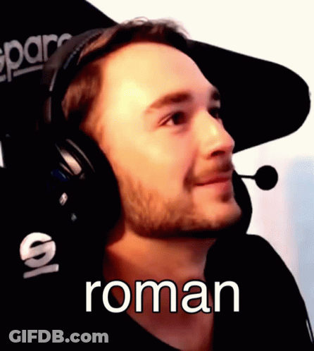 Bearded Man With Headphones And Hat Saying Roman GIF