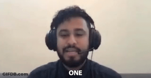 Bearded Man With Headphones And Microphone Saying One GIF