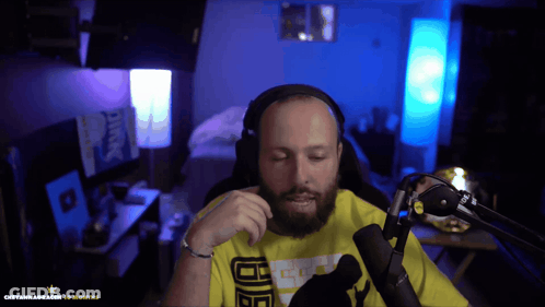 Bearded Man With Headphones And Yellow Shirt Saying D8 GIF