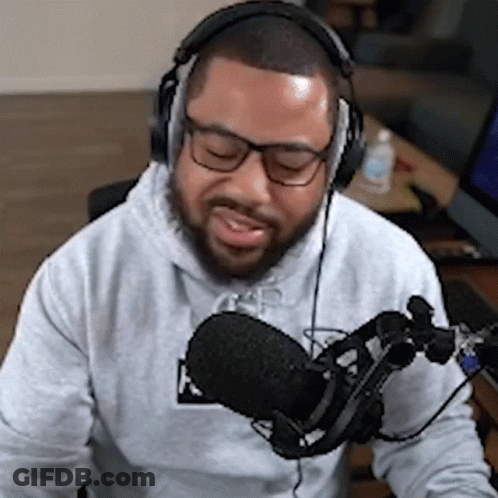 Bearded Man With Headphones At Microphone GIF