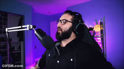 Bearded Man With Headphones Glasses At Microphone GIF