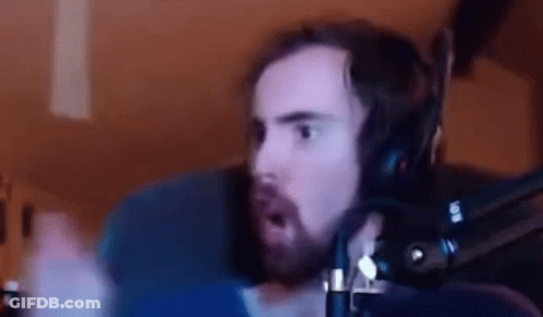 Bearded Man With Headphones Making Funny Face At Microphone GIF