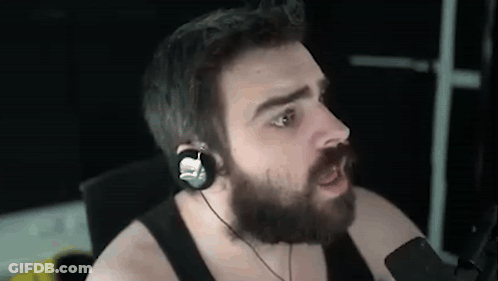 Bearded Man With Headphones Making Funny Face At Microphone GIF