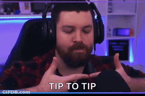 Bearded Man With Headphones Making Hand Gesture GIF