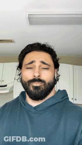 Bearded Man With Headphones Sad Face GIF