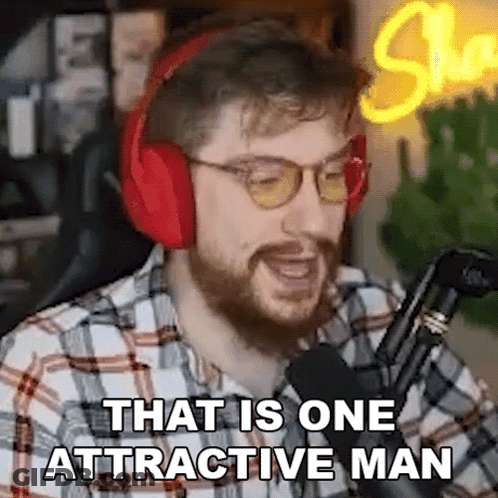 Bearded Man With Headphones Talking Into Microphone GIF