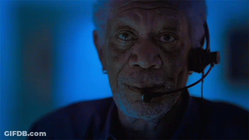 Bearded Man With Headset Looking At Camera GIF