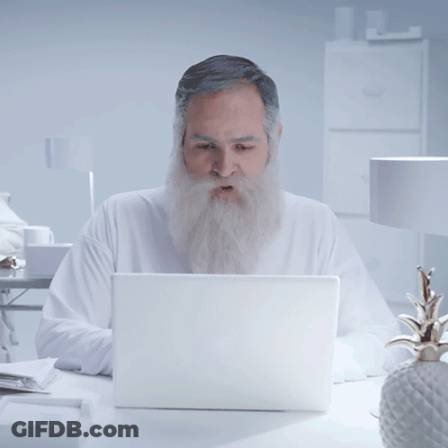 Bearded Man With Laptop Saying Ay Dios Mio GIF
