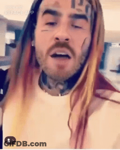Bearded Man With Long Hair And Face Tattoo GIF