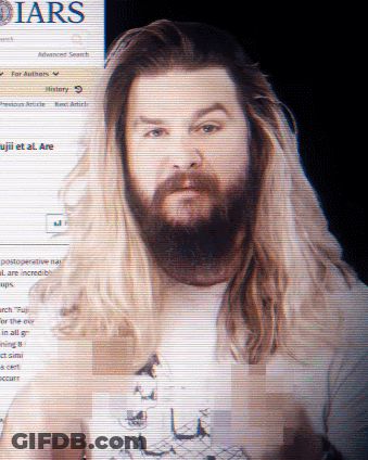 Bearded Man With Long Hair At Diarists Screen GIF