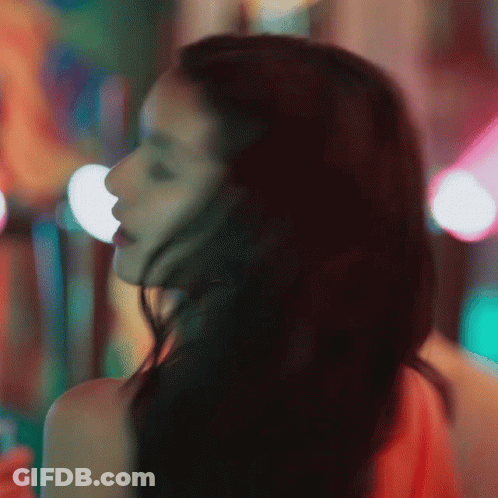 Bearded Man With Long Hair By Popcorn Machine GIF