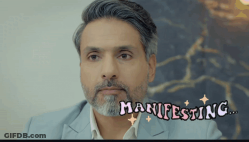 Bearded Man With Manifesting Written On Face GIF