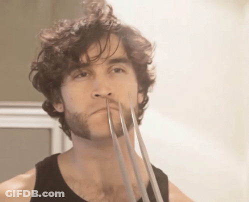 Bearded Man With Metal Claws GIF