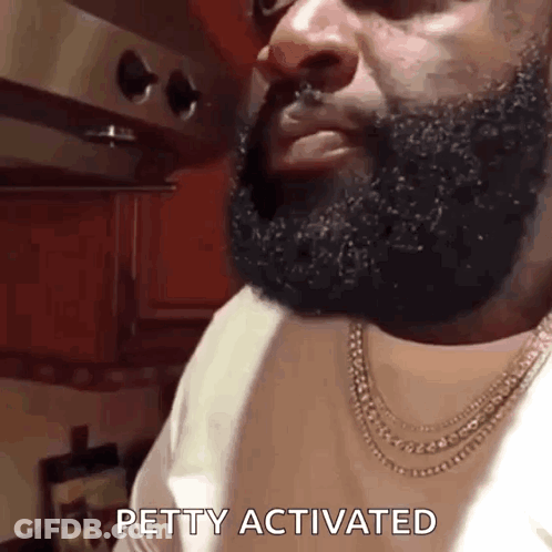 Bearded Man With Necklace Says Petty Activated GIF