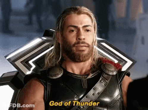 Bearded Man With Shield Saying God Of Thunder GIF