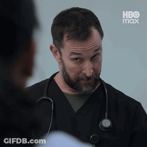 Bearded Man With Stethoscope Talking To Woman In HBO Max Ad GIF