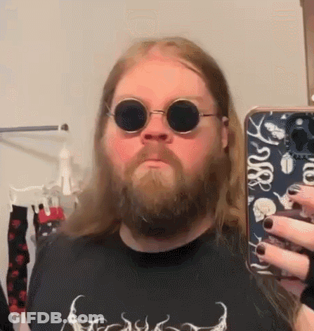 Bearded Man With Sunglasses Taking Selfie GIF