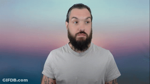 Bearded Man With Tattoos In White T-Shirt GIF