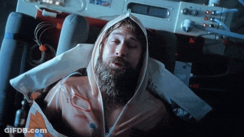 Bearded Man Wrapped In USA Logo Plastic Bag GIF