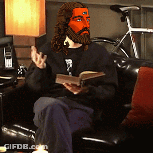 Bearded Three-Eyed Man Sitting On Couch With Book GIF