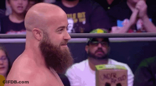 Bearded Wrestler Facing Crowd GIF