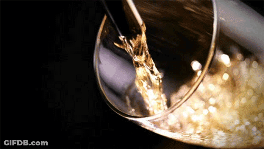 Beautiful Beer Pouring Down Glass GIF
