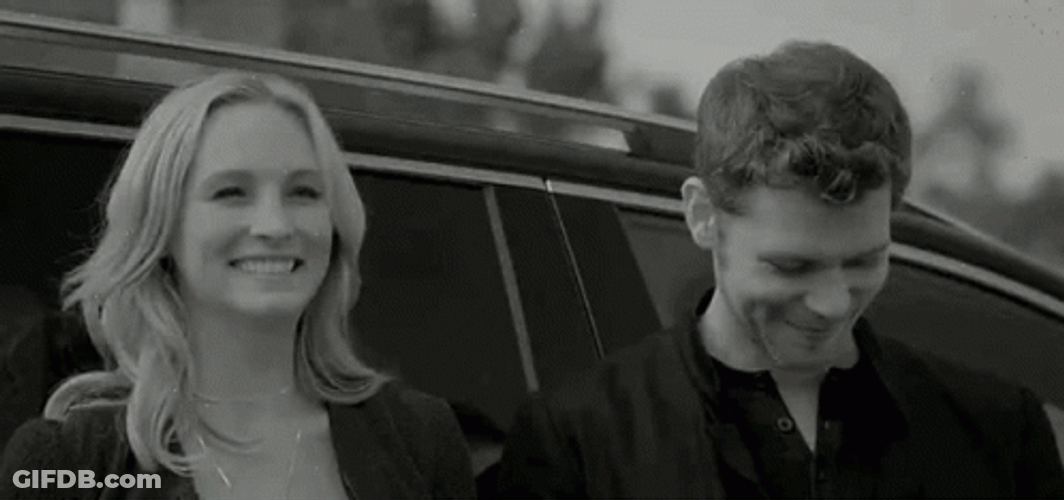 Beautiful Couple Exchanging Maybe So GIF