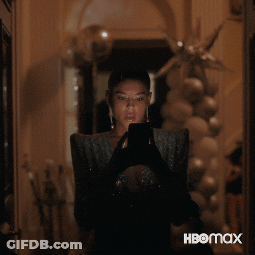 Beautiful Woman Sending Text Message During Event GIF