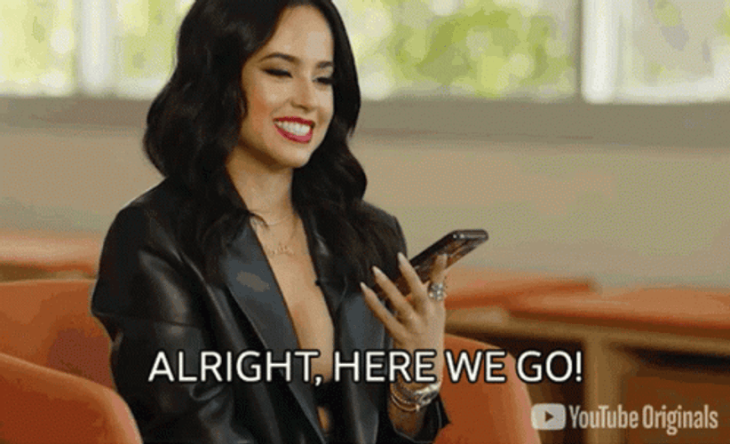Becky G Talking Speaker Phone Smiling GIF