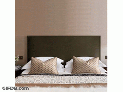 Bed With Two Pillows And Headboard GIF