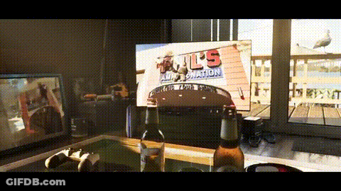 Beer Bottle In Front Of U.S. Air Force Sign GIF