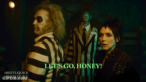 Beetlejuice Movie Poster Man And Woman GIF