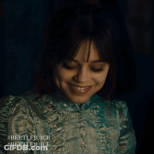 Beetlejuice Poster Woman With Black Eyes GIF