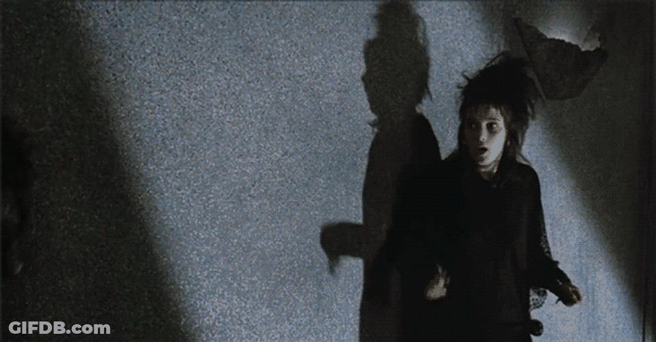 Beetlejuice Scaring A Woman GIF