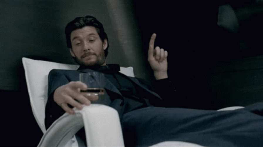 Ben Barnes Relaxing On Bench GIF