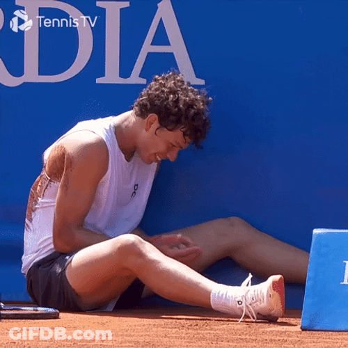 Ben Shelton Sitting On The Ground GIF
