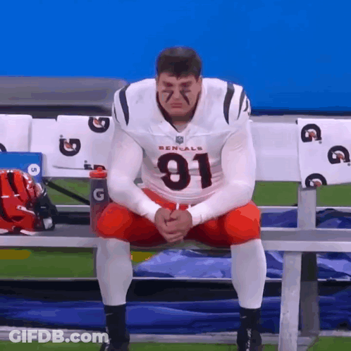 Bengals Player Sitting On Bench Eyes Closed GIF