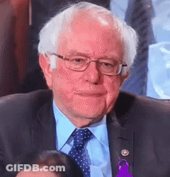 Bernie Sanders Is Wearing Glasses And A Suit And Tie . GIF