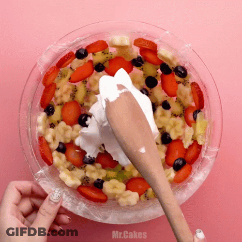 Berries And Cream Topped With Bread Slices GIF