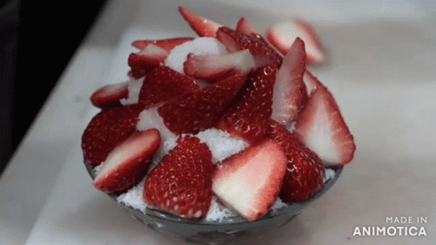 Berries And Cream Topped With Sliced Fruit GIF