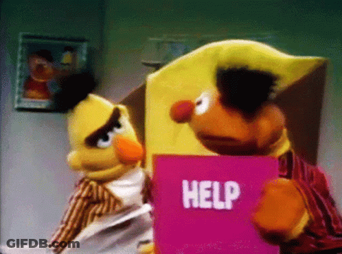 Bert And Ernie Holding Pink Help Sign GIF