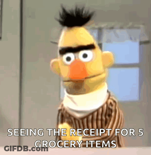 Bert From Sesame Street Is Looking At A Receipt For 5 Grocery Items GIF