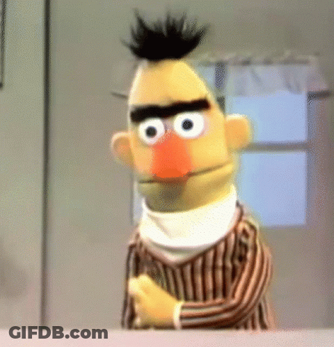 Bert From Sesame Street Is Wearing A Striped Shirt And Scarf GIF
