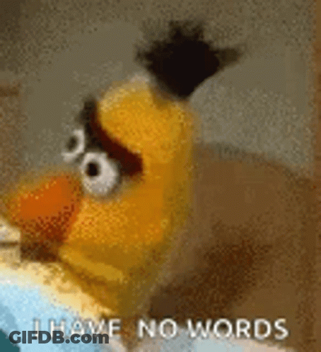 Bert From Sesame Street Says `` I Have No Words '' While Sitting On A Bed . GIF