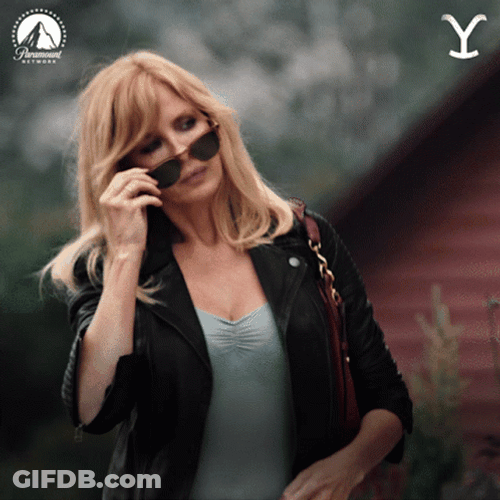 Beth Dutton Smiling With Shades GIF