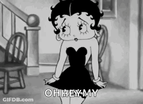Betty Boop Sitting On Chair In Black Dress GIF